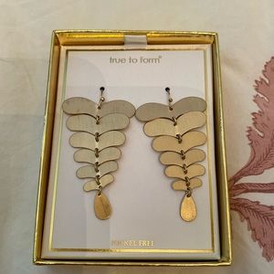 True to form new earrings gold